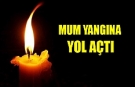 Mum yangına neden oldu
