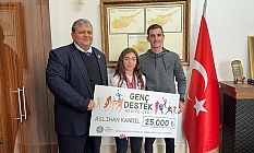 Evkaf’tan Milli Atlet Kandil’e destek